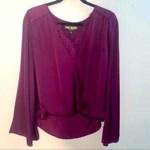 . Stunning burgundy blouse by Marc Bouer